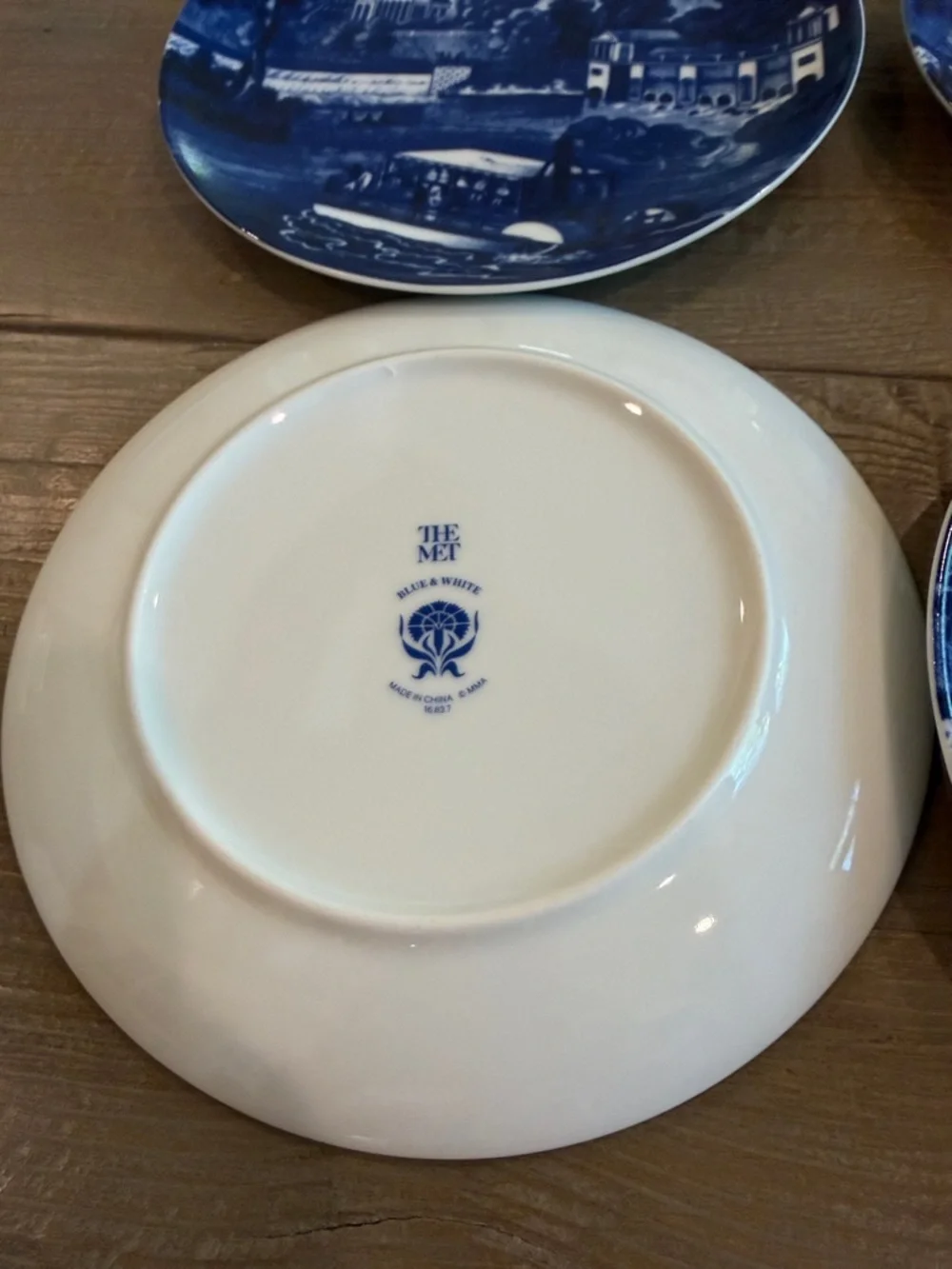 Set of 4 blue/ white collectible plates from “The Met” Museum